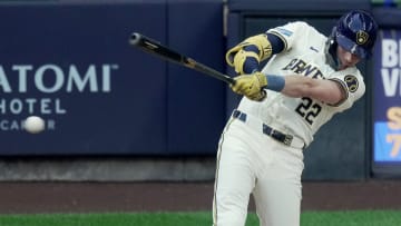 Milwaukee Brewers outfielder Christian Yelich (22) hits a single during the third inning against the Pittsburgh Pirates at American Family Field in Milwaukee, Wisconsin on July 10.