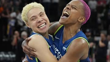 Minnesota Lynx guard Natisha Hiedeman (2) and guard Courtney Williams (10) celebrate the win over the Los Angeles Sparks after the game at Target Center. 