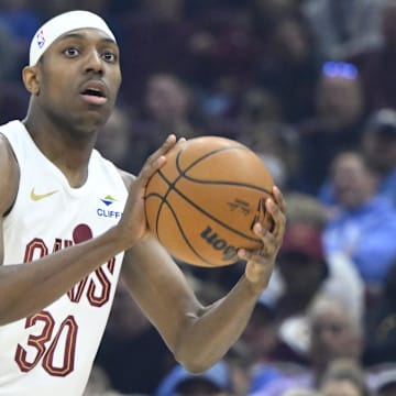 Apr 13, 2025; Cleveland, Ohio, USA; Cleveland Cavaliers forward Nae'Qwan Tomlin (30) looks to shoot in the first quarter against the Indiana Pacers at Rocket Arena. Mandatory Credit: David Richard-Imagn Images