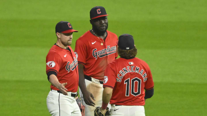 Aug 24, 2024; Cleveland, Ohio, USA; Cleveland Guardians outfielders Lane Thomas (8),  Jhonkensy Noel (43) and Daniel Schneemann (10) react after defeating  the Texas Rangers at Progressive Field. Mandatory Credit: David Richard-USA TODAY Sports