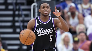 Oct 15, 2024; Salt Lake City, Utah, USA; Sacramento Kings guard De'Aaron Fox (5) calls out a play against the Utah Jazz during the third quarter at Delta Center. Mandatory Credit: Rob Gray-Imagn Images