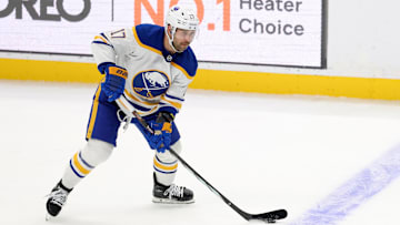 Nov 20, 2024; Los Angeles, California, USA;  Buffalo Sabres left wing Jason Zucker (17) controls the puck during the third period against the Los Angeles Kings at Crypto.com Arena. Mandatory Credit: Kiyoshi Mio-Imagn Images