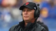 Oct 25, 2025; Pittsburgh, Pennsylvania, USA;  North Carolina State Wolfpack head coach Dave Doeren looks on from the sidelines against the Pittsburgh Panthers during the first quarter at Acrisure Stadium. Mandatory Credit: Charles LeClaire-Imagn Images