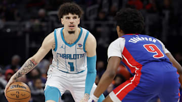Jan 24, 2024; Detroit, Michigan, USA;  Charlotte Hornets guard LaMelo Ball (1) dribbles defended by Detroit Pistons forward Ausar Thompson (9): Rick Osentoski-Imagn Images