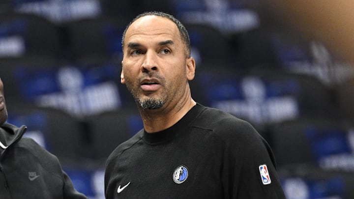 Oct 7, 2024; Dallas, Texas, USA; Dallas Mavericks general manager Nico Harrison (right) looks on during warms up before the game between the Dallas Mavericks and the Memphis Grizzlies at the American Airlines Center. Mandatory Credit: Jerome Miron-Imagn Images