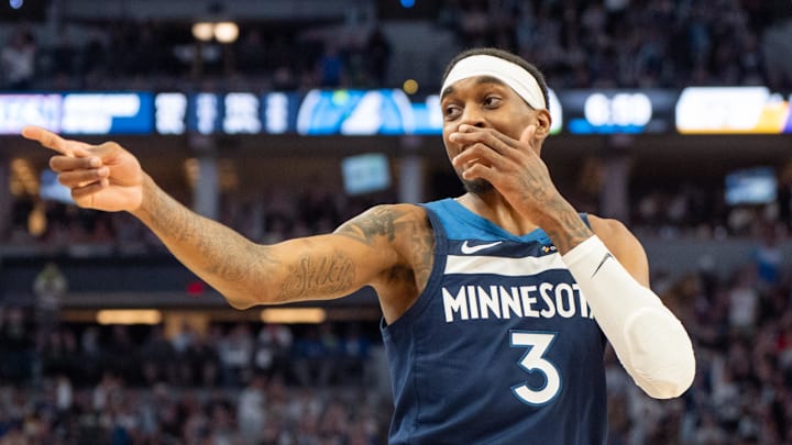 Apr 27, 2025; Minneapolis, Minnesota, USA; Minnesota Timberwolves forward Jaden McDaniels (3) celebrates a three pointer made against the Los Angeles Lakers in the third quarter during game four of first round for the 2025 NBA Playoffs at Target Center. Mandatory Credit: Matt Blewett-Imagn Images