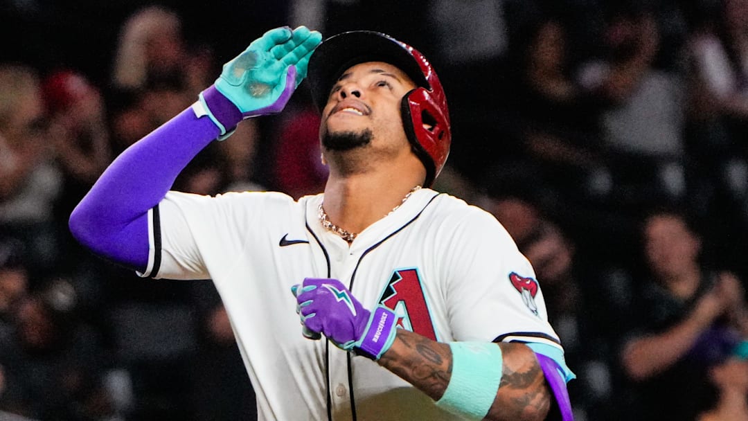 Sep 2, 2025; Phoenix, Arizona, USA; Arizona Diamondbacks second base Ketel Marte (4) celebrates his three run home run in the seventh inning of the game between Arizona Diamondbacks and Texas Rangers at Chase Field. Mandatory Credit: Arianna Grainey-Imagn Images