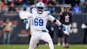 Detroit Lions linebacker Al-Quadin Muhammad (69) celebrates a sack against Chicago Bears quarterback Caleb Williams (18) during the second half at Soldier Field in Chicago, Ill. on Sunday, Dec. 22, 2024.