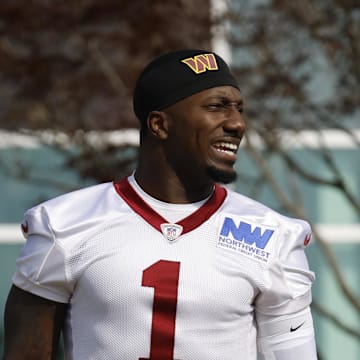 Jul 23, 2025; Ashburn, VA, USA; Washington Commanders wide receiver Deebo Samuel Sr. (1) walks out of team headquarters onto the fields prior to practice on day one of training camp at OrthoVirginia Training Center at Commanders Park. Mandatory Credit: Geoff Burke-Imagn Images