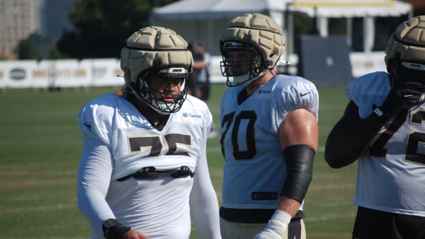 Taliese Fuaga, Trevor Penning and Josiah Ezirim at Saints training camp Day 16. 