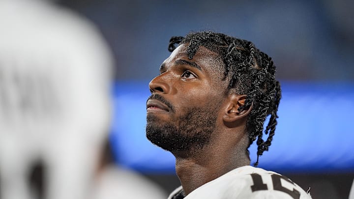 Aug 8, 2025; Charlotte, North Carolina, USA; Cleveland Browns quarterback Shedeur Sanders (12) on the sideline during the second half against the Carolina Panthers at Bank of America Stadium. Mandatory Credit: Jim Dedmon-Imagn Images