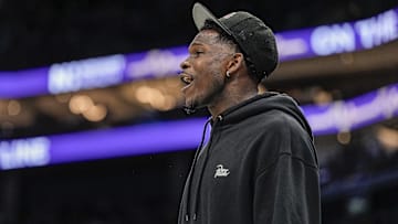 Nov 1, 2025; Charlotte, North Carolina, USA; Minnesota Timberwolves guard Anthony Edwards (5) yells from the bench during the second quarter against the Charlotte Hornets at Spectrum Center.