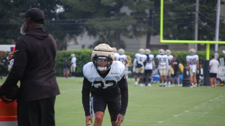 Tyrann Mathieu with Marcus Robertson for drills at Saints training camp.