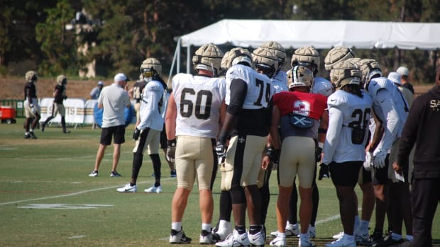 Jake Haener works with the third team Saints offense during Day 13 of Saints training camp.