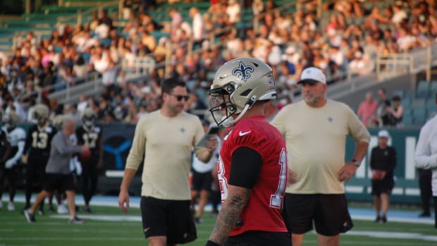 Spencer Rattler goes through drills during Saints training camp practice at Tulane's Yulman Stadium.