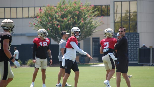 Saints quarterbacks Spencer Rattler, Derek Carr and Jake Haener working with Andrew Janocko.