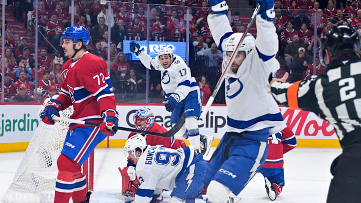 May 1, 2026; Montreal, Quebec, CAN; Tampa Bay Lightning forward Gage Goncalves (93) scores the winning  goal against Montreal Canadiens goalie Jakub Dobes (75) during the overtime period in game six of the first round of the 2026 Stanley Cup Playoffs at the Bell Centre. Mandatory Credit: Eric Bolte-Imagn Images