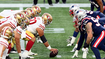 Oct 25, 2020; Foxborough, Massachusetts, USA; San Francisco 49ers center Hroniss Grasu (50) prepares to snap the ball against the New England Patriots during the first half at Gillette Stadium. Mandatory Credit: Brian Fluharty-Imagn Images
