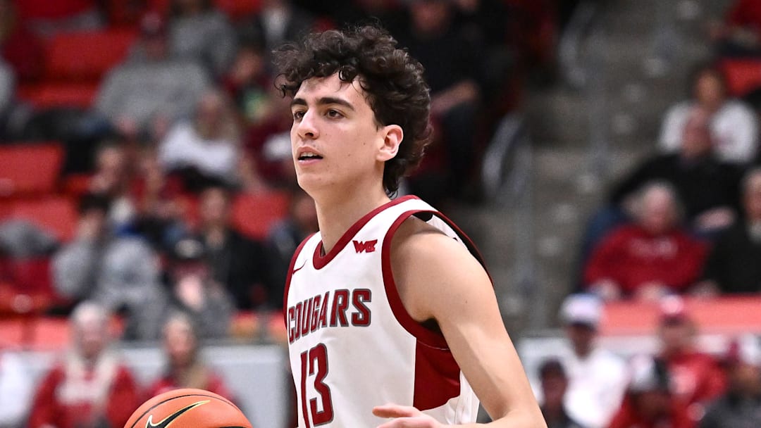 Jan 15, 2026; Pullman, Washington, USA; Washington State Cougars guard Adria Rodriguez (13) controls the ball against the Gonzaga Bulldogs in the first half at Friel Court at Beasley Coliseum. Mandatory Credit: James Snook-Imagn Images