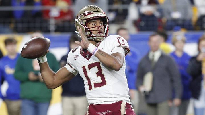 Nov 4, 2023; Pittsburgh, Pennsylvania, USA;  Florida State Seminoles quarterback Jordan Travis (13) passes the ball against the Pittsburgh Panthers during the third quarter at Acrisure Stadium. The Seminoles won 24-7. Mandatory Credit: Charles LeClaire-Imagn Images