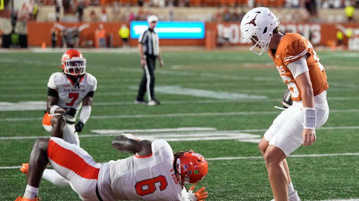 Texas quarterback Arch Manning has gone viral for his staredown of a Sam Houston defender in Saturday's 55-0 win. Texas quarterback Arch Manning has gone viral for his staredown of a Sam Houston defender in Saturday's 55-0 win.