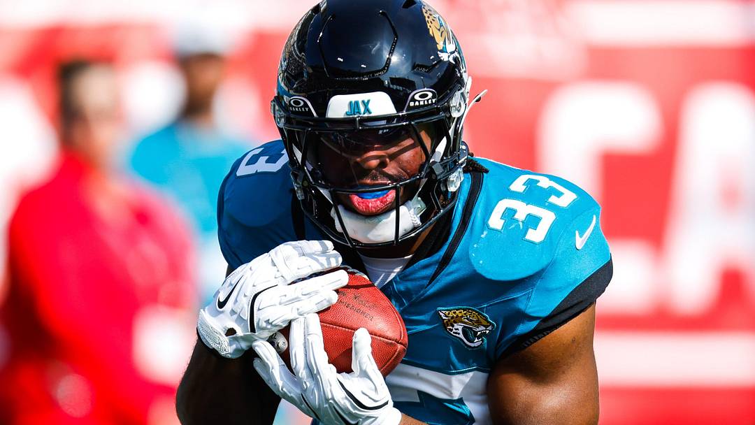 Jacksonville Jaguars running back Bhayshul Tuten (33) returns a kick off return during the first quarter in an NFL football AFC Wild Card playoff matchup, Sunday, Jan. 11, 2026, in Jacksonville, Fla. Bills lead 10-7 at the half over the Jaguars.