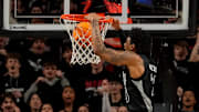 Cincinnati Bearcats forward Dillon Mitchell (23) dunks in the first half of the 92nd Annual Crosstown Shootout NCAA basketball game between the Cincinnati Bearcats and the Xavier Musketeers at Fifth Third Arena on the UC campus in Cincinnati on Saturday, Dec. 14, 2024. Xavier led 31-30 at halftime.