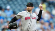 Jul 23, 2024; Kansas City, Missouri, USA; Arizona Diamondbacks starting pitcher Jordan Montgomery (52) pitches during the first inning against the Kansas City Royals at Kauffman Stadium. Mandatory Credit: Jay Biggerstaff-USA TODAY Sports