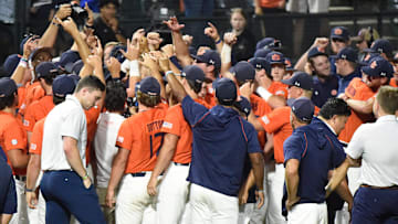 Auburn players celebrate winning their NCAA Regional Baseball Tournament at Plainsman Park in Auburn, Ala., on Sunday June 1, 2025.