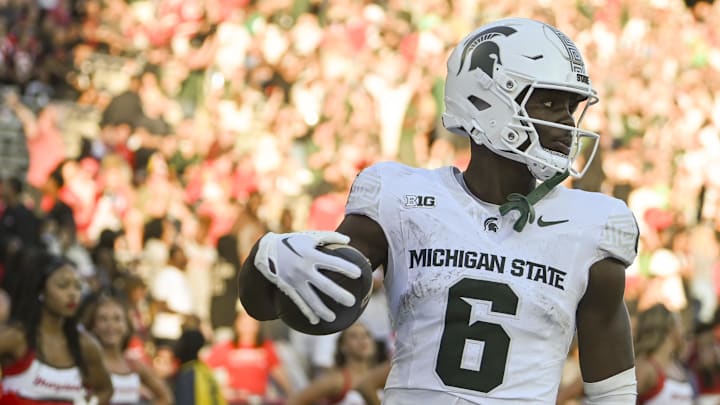 Sep 7, 2024; College Park, Maryland, USA; *Michigan State Spartans wide receiver Nick Marsh (6) celebrates after scoring a touchdown during the second half against the Maryland Terrapins  at SECU Stadium. Mandatory Credit: Tommy Gilligan-Imagn Images