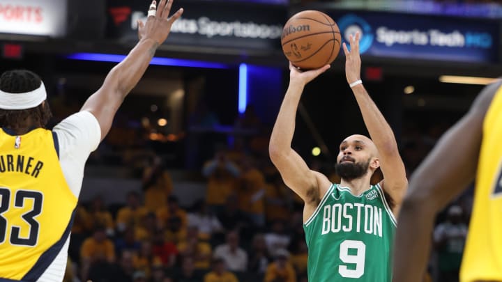 May 25, 2024; Indianapolis, Indiana, USA; Boston Celtics guard Derrick White (9) shoots the ball against Indiana Pacers center Myles Turner (33) during the third quarter of game three of the eastern conference finals in the 2024 NBA playoffs at Gainbridge Fieldhouse. Mandatory Credit: Trevor Ruszkowski-USA TODAY Sports