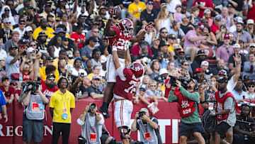 Oct 26, 2024; Tuscaloosa, Alabama, USA; Alabama Crimson Tide running back Jam Miller (26) celebrates with offensive lineman Parker Brailsford (72) after scoring a touchdown against the Missouri Tigers during the third quarter at Bryant-Denny Stadium. Mandatory Credit: Will McLelland-Imagn Images