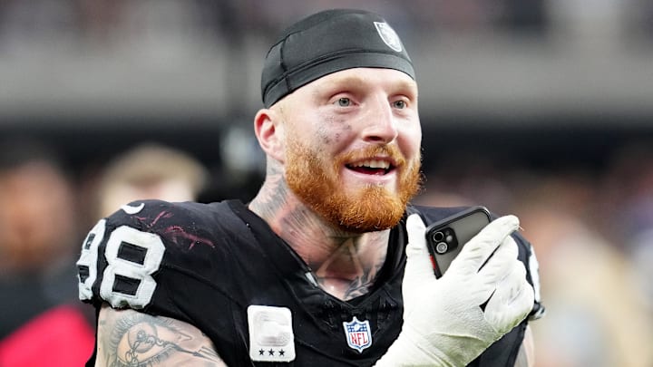 Oct 15, 2023; Paradise, Nevada, USA; Las Vegas Raiders defensive end Maxx Crosby (98) celebrates after the Raiders defeated the New England Patriots 21-17 at Allegiant Stadium. Mandatory Credit: Stephen R. Sylvanie-Imagn Images
