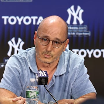 Aug 23, 2023; Bronx, New York, USA; New York Yankees general manager Brian Cashman talks with the media before the game between the Yankees and the Washington Nationals at Yankee Stadium. Mandatory Credit: Vincent Carchietta-Imagn Images