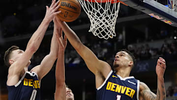 Michael Porter Jr. grabs a rebound