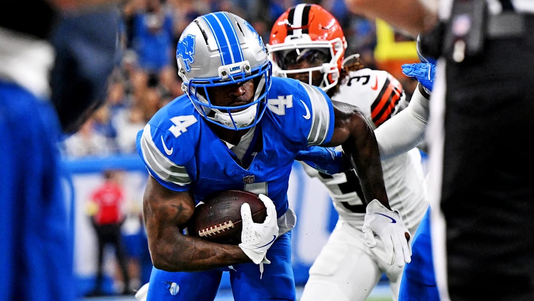 Detroit Lions cornerback D.J. Reed (4) runs the ball during the first half against the Cleveland Browns at Ford Field.