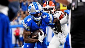 Detroit Lions cornerback D.J. Reed (4) runs the ball during the first half against the Cleveland Browns at Ford Field.