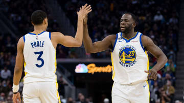 Jan 22, 2023; San Francisco, California, USA; Golden State Warriors guard Jordan Poole (3) and forward Draymond Green (23) celebrate after Poole drew a foul against the Brooklyn Nets during the first half at Chase Center. Mandatory Credit: John Hefti-USA TODAY Sports