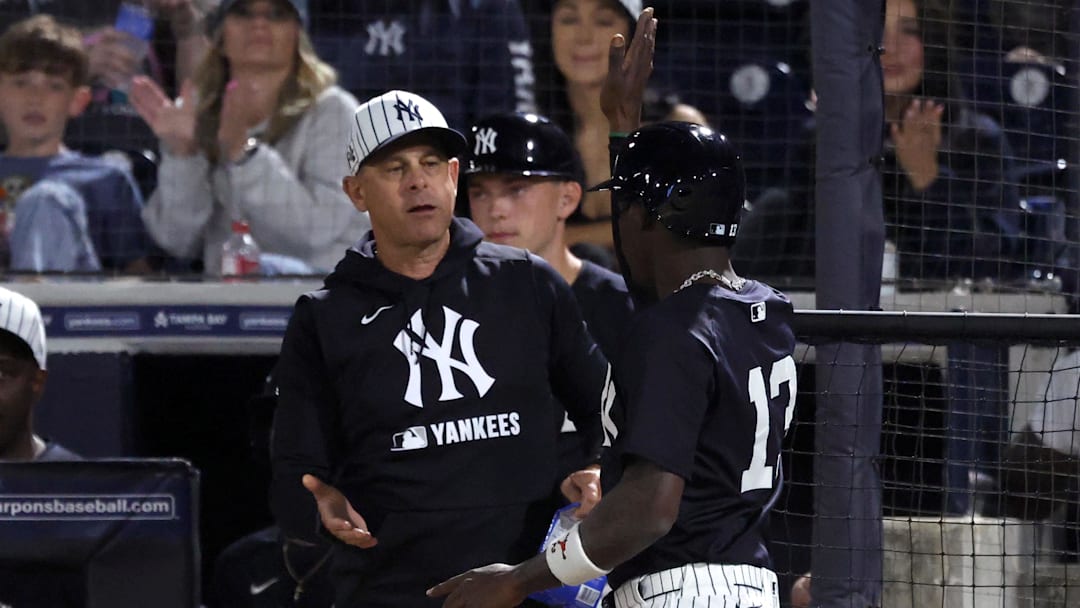 Mar 3, 2025; Tampa, Florida, USA; New York Yankees third base Jazz Chisholm Jr. (13) is congratulated by manager Aaron Boone (17) after he scored a run during the fifth inning against the Pittsburgh Pirates at George M. Steinbrenner Field. Mandatory Credit: Kim Klement Neitzel-Imagn Images Mar 3, 2025; Tampa, Florida, USA; New York Yankees third base Jazz Chisholm Jr. (13) is congratulated by manager Aaron Boone (17) after he scored a run during the fifth inning against the Pittsburgh Pirates at George M. Steinbrenner Field. Mandatory Credit: Kim Klement Neitzel-Imagn Images
