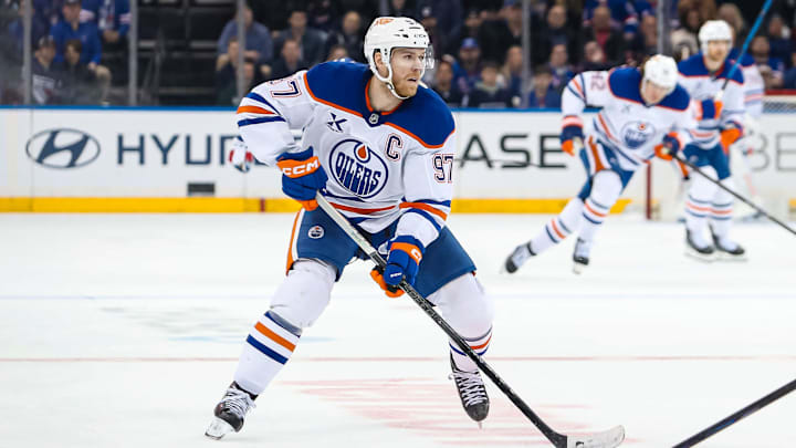 Edmonton Oilers center Connor McDavid skates against the New York Rangers. Edmonton Oilers center Connor McDavid skates against the New York Rangers.