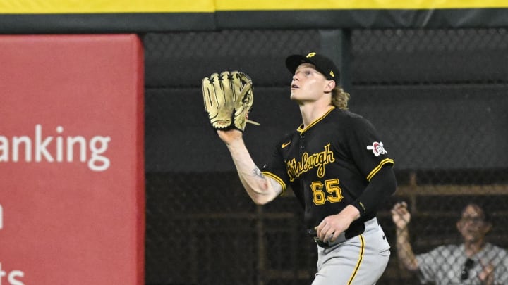 Jul 12, 2024; Chicago, Illinois, USA;  Pittsburgh Pirates outfielder Jack Suwinski (65) catches a fly ball hit by Chicago White Sox catcher Korey Lee (26) during the seventh inning at Guaranteed Rate Field. Mandatory Credit: Matt Marton-USA TODAY Sports