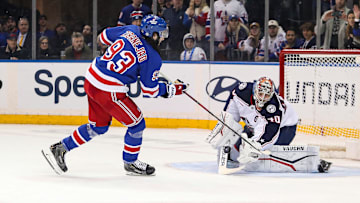 Jan 18, 2025; New York, New York, USA; New York Rangers center Mika Zibanejad (93) takes a shot at Columbus Blue Jackets goalie Daniil Tarasov (40) in a shootout at Madison Square Garden. Mandatory Credit: Danny Wild-Imagn Images