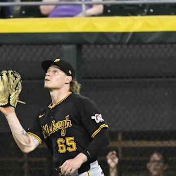 Jul 12, 2024; Chicago, Illinois, USA;  Pittsburgh Pirates outfielder Jack Suwinski (65) catches a fly ball hit by Chicago White Sox catcher Korey Lee (26) during the seventh inning at Guaranteed Rate Field. Mandatory Credit: Matt Marton-Imagn Images