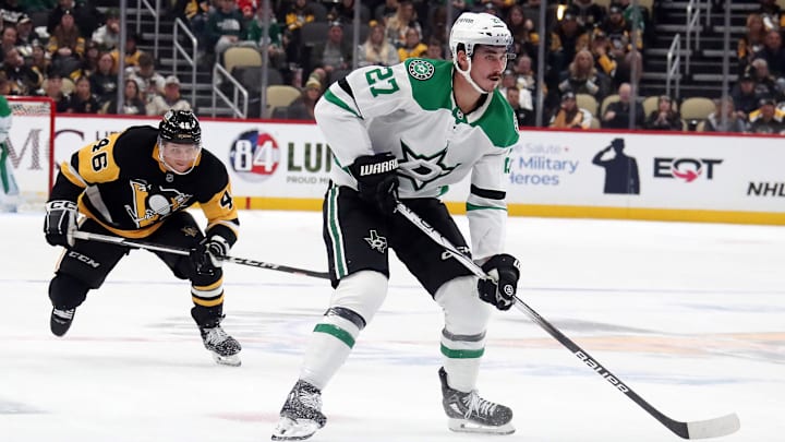 Nov 11, 2024; Pittsburgh, Pennsylvania, USA;  Dallas Stars left wing Mason Marchment (27) skates into the offensive zone with the puck ahead of center Blake Lizotte (46) during the second period at PPG Paints Arena. Mandatory Credit: Charles LeClaire-Imagn Images
