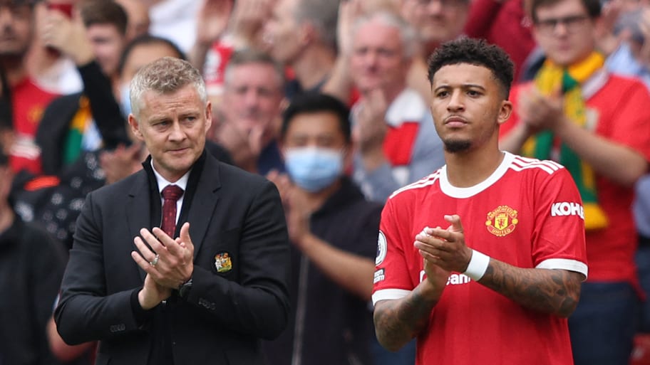 Ole Gunnar Solskjær (left) and Jadon Sancho.