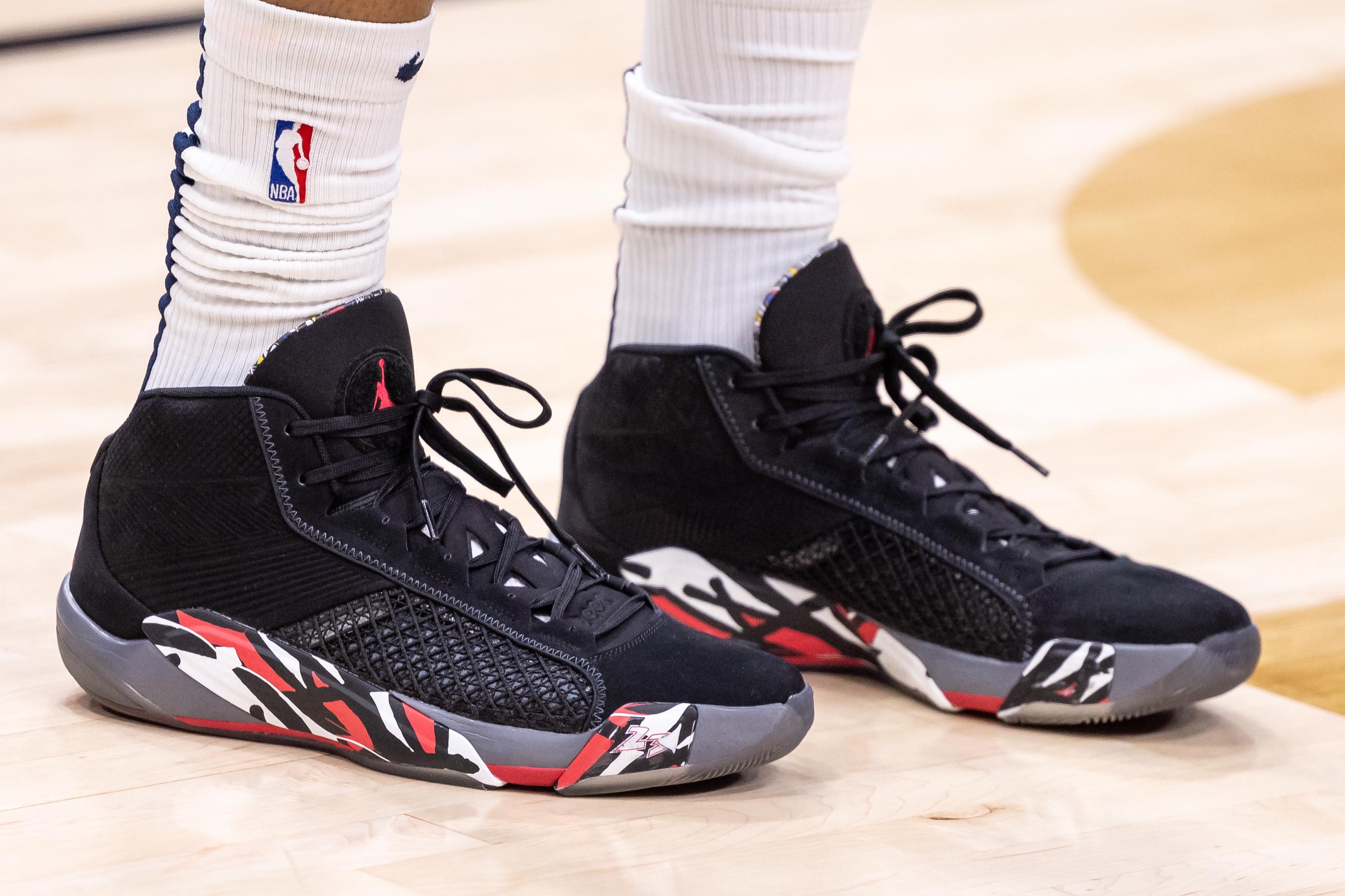New Orleans Pelicans forward Brandon Ingram's black and red Air Jordan sneakers.