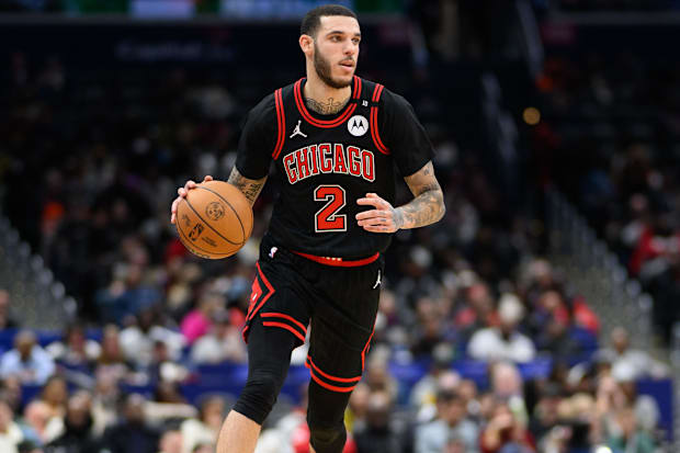 Lonzo Ball (2) manages the balloon