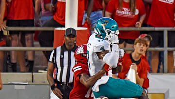 Coastal Carolina's Cameron Wright tries to make a catch as Jacksonville State's Zechariah Poyser breaks up the play during college football action at Burgess-Snow Field AmFirst Stadium in Jacksonville, Alabama August 29, 2024. 