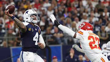 Nov 27, 2025; Arlington, Texas, USA; Dallas Cowboys quarterback Dak Prescott (4) throws a pass against Kansas City Chiefs safety Chamarri Conner (27) during the first quarter at AT&T Stadium. Mandatory Credit: Kevin Jairaj-Imagn Images