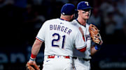 May 27, 2025; Arlington, Texas, USA; Texas Rangers first baseman Jake Burger (21) celebrates with Texas Rangers third baseman Josh Jung (6) after the game against the Toronto Blue Jays at Globe Life Field